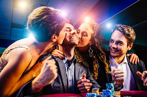 Live baccarat table with dealer and cards
